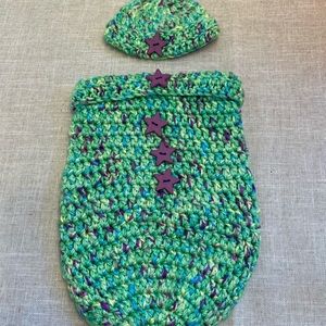 Crocheted baby hat with matching cocoon.